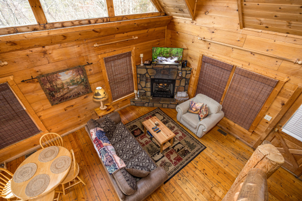 Ariel view of the livingroom at Deerly Beloved, a 1 bedroom cabin rental located in Pigeon Forge