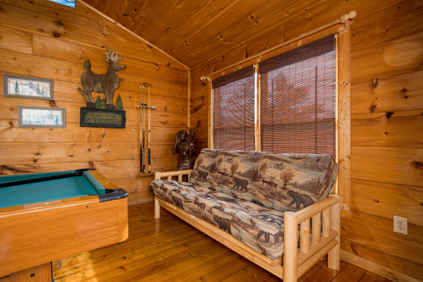 Futon at Deerly Beloved, a 1 bedroom cabin rental located in Pigeon Forge