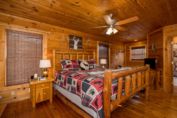 Master bedroom at Deerly Beloved, a 1 bedroom cabin rental located in Pigeon Forge