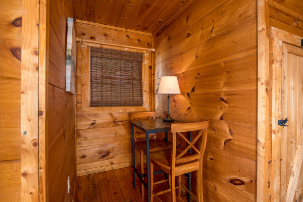 Seating for two at Deerly Beloved, a 1 bedroom cabin rental located in Pigeon Forge