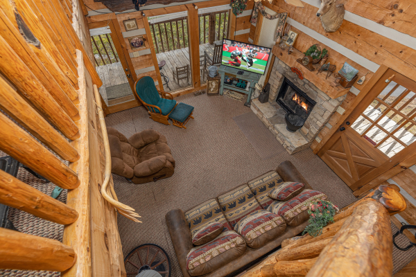 Looking down at the living room at Stellar View, a 1 bedroom cabin rental located in Pigeon Forge