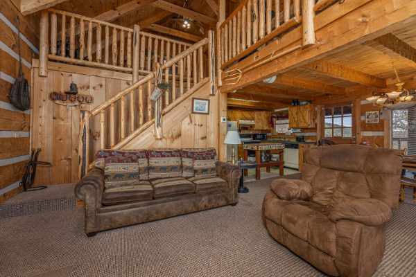 Sofa and large recliner at Stellar View, a 1 bedroom cabin rental located in Pigeon Forge