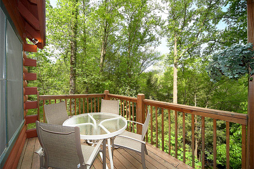 Deck with patio table at Shiloh, a 3 bedroom cabin rental located in Gatlinburg