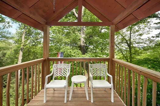 Third floor covered deck at Shiloh, a 3 bedroom cabin rental located in Gatlinburg