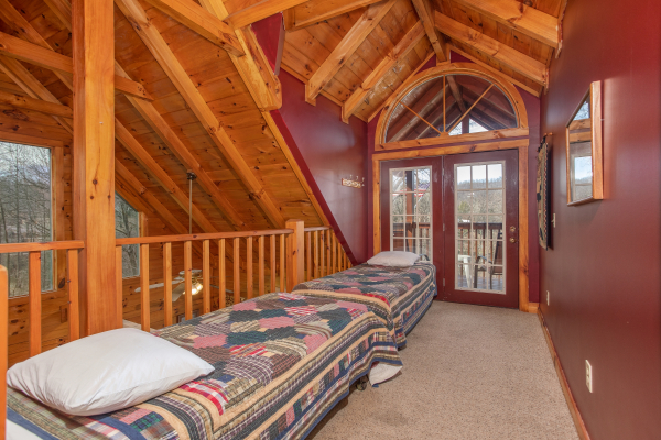 Twin beds on the upper level at Shiloh, a 3 bedroom cabin rental located in Gatlinburg