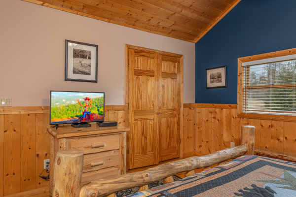 Television in a bedroom at Almost Bearadise, a 4 bedroom cabin rental located in Pigeon Forge