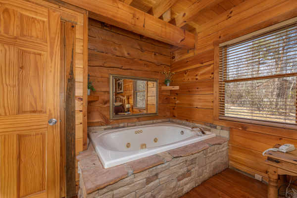 Jacuzzi tub at Smoky Bears Creek, a 2 bedroom cabin rental located in Pigeon Forge