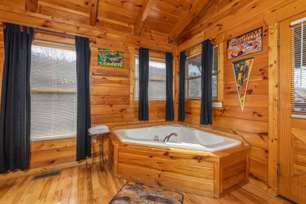 Jacuzzi in the loft bedroom at Nascar Nation, a 2 bedroom cabin rental located in Pigeon Forge