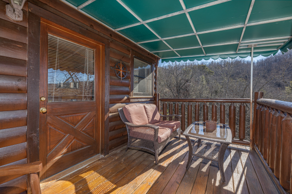 Deck off the loft bedroom at Nascar Nation, a 2 bedroom cabin rental located in Pigeon Forge