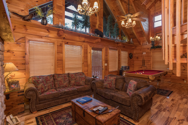 living room sofa and loveseat at always & forever a 1 bedroom cabin rental located in pigeon forge