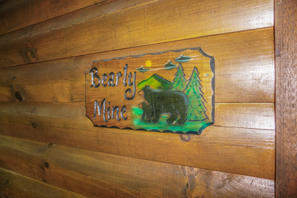 Custom welcome sign at  Bearly Mine, a 1-bedroom cabin rental in Pigeon Forge