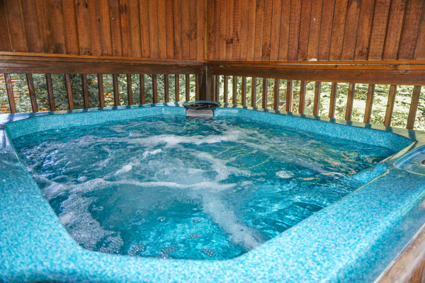 Hot tub at Bearly Mine, a 1-bedroom cabin rental in Pigeon Forge
