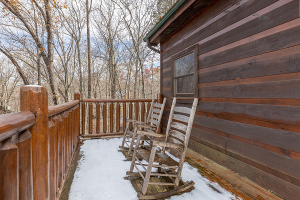 Rocking chairs on the deck at Dragonfly, a 2 bedroom cabin rental located in Gatlinburg