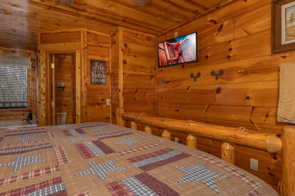 TV in a bedroom at Dragonfly, a 2 bedroom cabin rental located in Gatlinburg