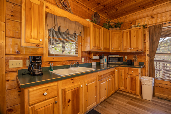 Kitchen counters at Mountain Magic, a 1 bedroom cabin rental located in Pigeon Forge