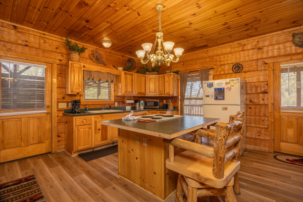 Kitchen seating at Mountain Magic, a 1 bedroom cabin rental located in Pigeon Forge