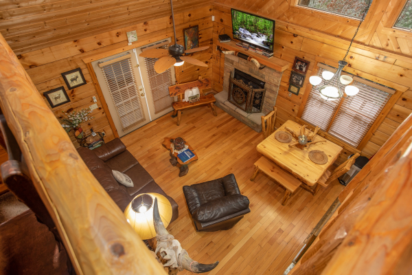 Looking down on the main floor from the loft at Alpine Romance, a 2 bedroom cabin rental located in Pigeon Forge