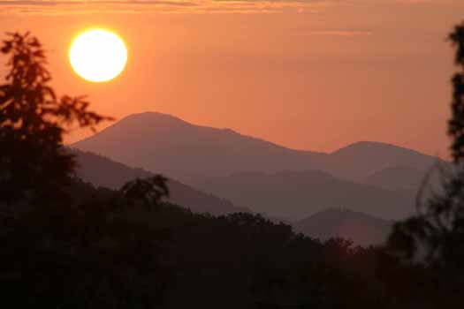 smoky mountain sunrise as seen from alpine romance a 2 bedroom cabin rental located in pigeon forge