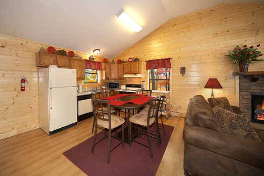 Kitchen and dining area at Raccoon's Rest, a 2 bedroom cabin rental located in Pigeon Forge