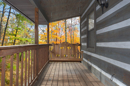 Rear deck at Raccoon's Rest, a 2 bedroom cabin rental located in Pigeon Forge
