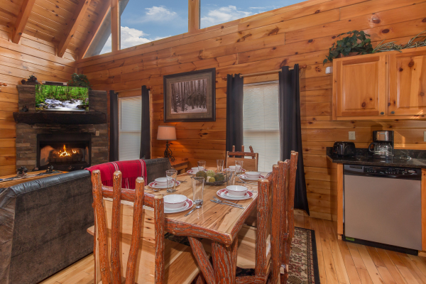 Dining room with seating for six at Country Bear's Getaway, a 3-bedroom cabin rental located in Gatlinburg