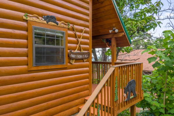 Stairs to the front porch at Away From it All, a 1 bedroom cabin rental located in Pigeon Forge