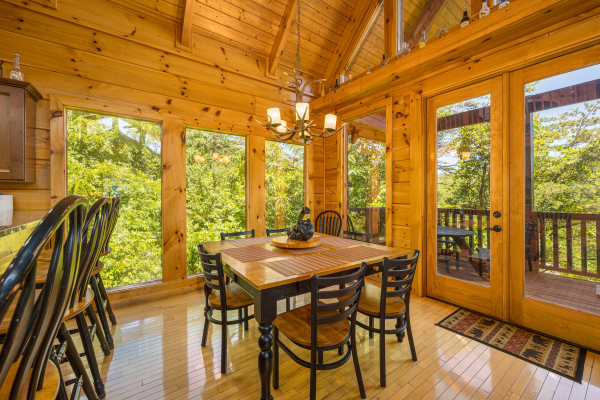Kitchen table at Moonbeams & Cabin Dreams, a 3 bedroom cabin rental located in Pigeon Forge
