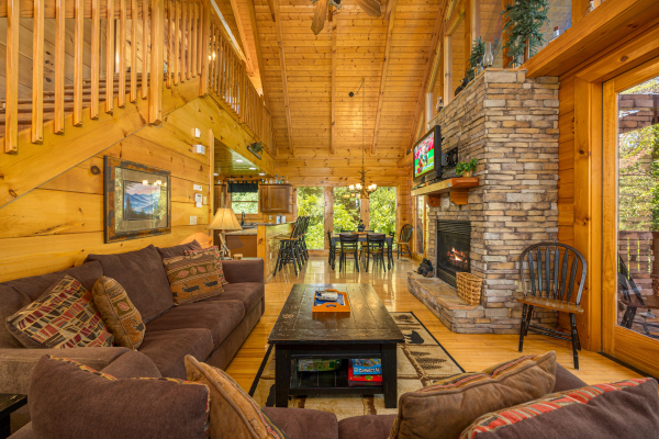 Living room at Moonbeams & Cabin Dreams, a 3 bedroom cabin rental located in Pigeon Forge
