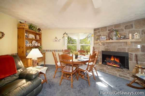 Living room at Dolly's Adorable River Cottage, a 3-bedroom cabin rental located in Pigeon Forge