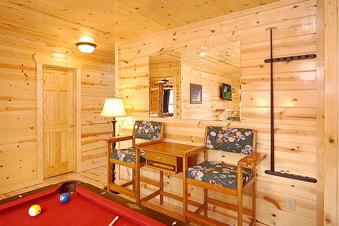 Game room seating on first floor at Natural Wonder, a 4 bedroom cabin rental located in Gatlinburg