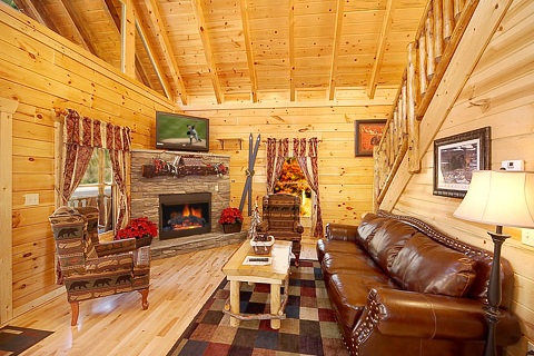 Living room with fireplace at Natural Wonder, a 4 bedroom cabin rental located in Gatlinburg