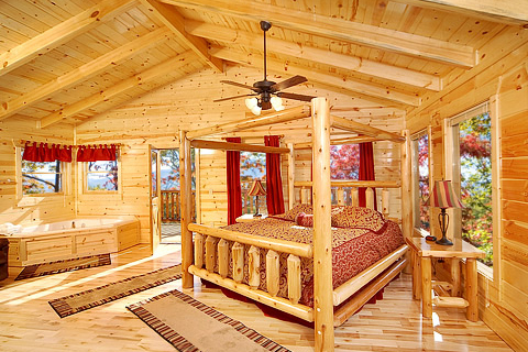 Third floor king bedroom with jacuzzi tub at Natural Wonder, a 4 bedroom cabin rental located in Gatlinburg