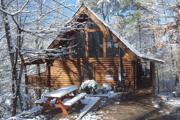 Snowy exterior at A Lover's Secret a 1 bedroom cabin rental located in Gatlinburg