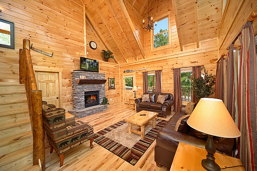 Living room with fireplace at Pool House, a 2 bedroom cabin rental located in Gatlinburg