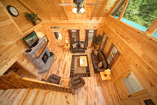 Loft view of living room at Pool House, a 2 bedroom cabin rental located in Gatlinburg