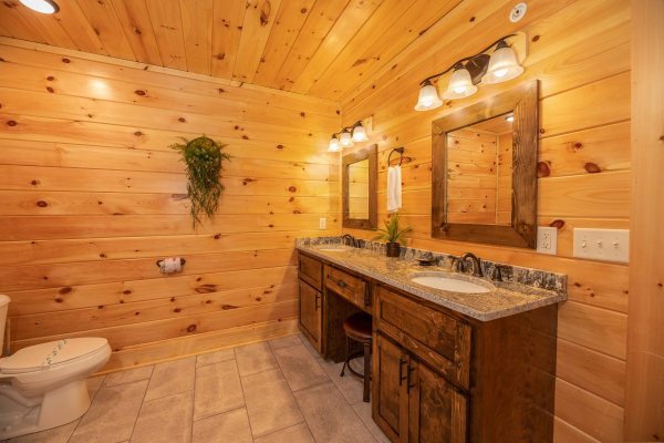 Bathroom with double vanity sinks at Elk Horn Lodge, a 5 bedroom cabin rental located in Gatlinburg
