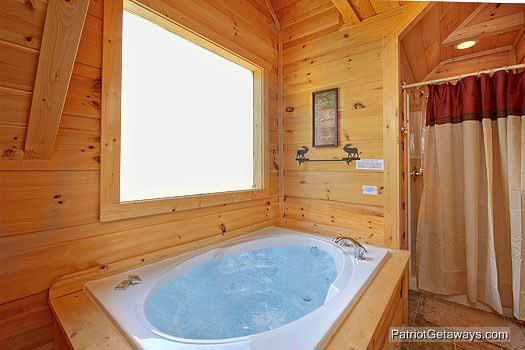 One of 5 jacuzzi tubs with showers in bathrooms at Alpine Pointe, a 5 bedroom cabin rental located in Gatlinburg