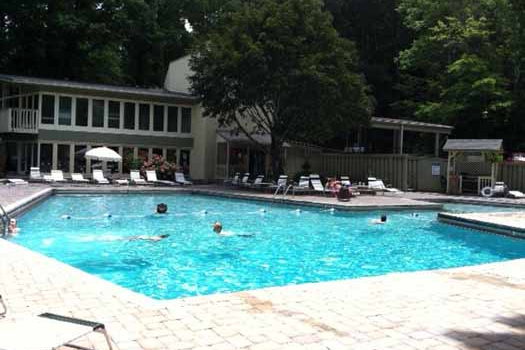 Enjoy the benefits of the resort pool area at Alpine Pointe, a 5 bedroom cabin rental located in Gatlinburg