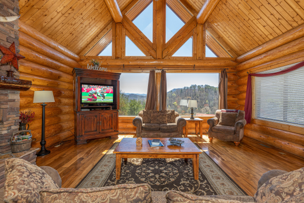 TV and mountain view at God's Country, a 4 bedroom cabin rental located in Pigeon Forge