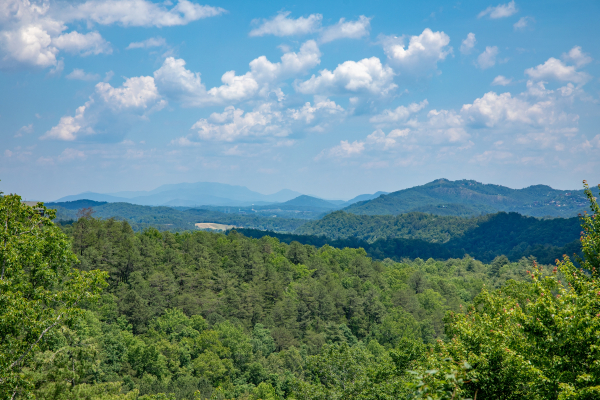 Looking out at the view from the deck at God's Country, a 4 bedroom cabin rental located in Pigeon Forge