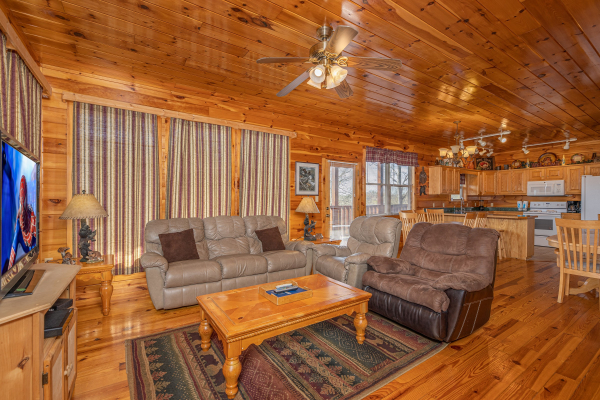 Seating in the main living room at Hickernut Lodge, a 5-bedroom cabin rental located in Pigeon Forge