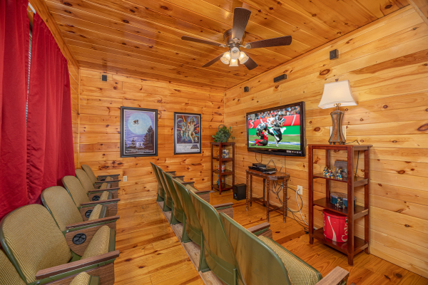 Theater room at Hickernut Lodge, a 5-bedroom cabin rental located in Pigeon Forge