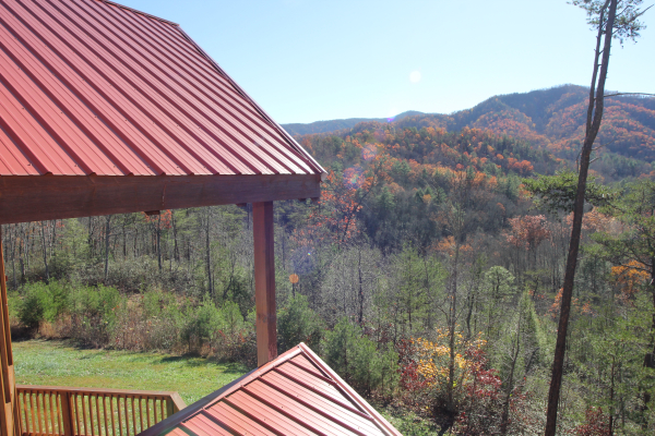 Fall colors seen from the upper deck at Four Seasons Lodge, a 3-bedroom cabin rental located in Pigeon Forge